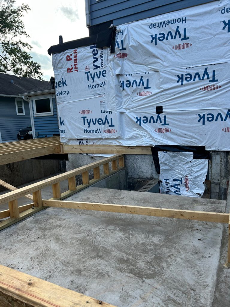 home addition post concrete