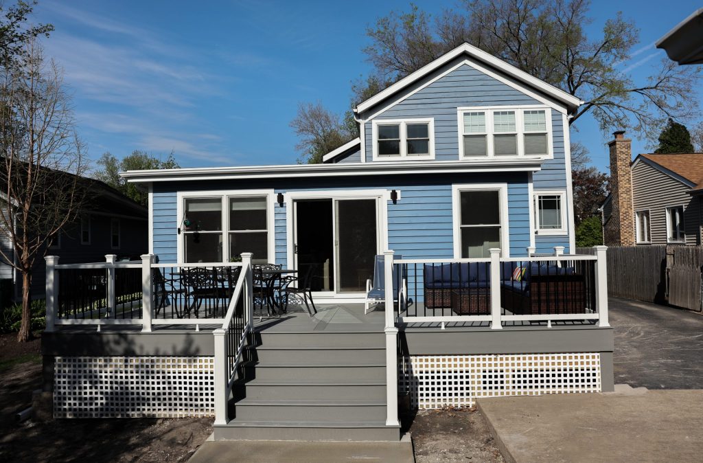 After: Low-maintenance Trex deck extending the living space outdoors.